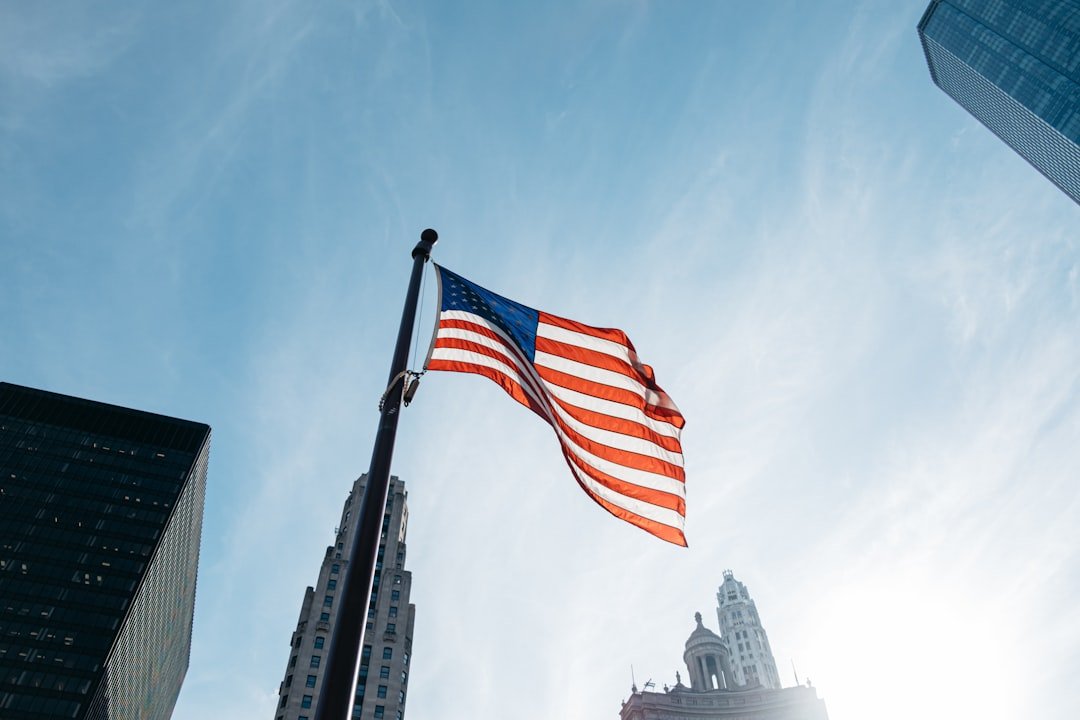 usa-flag-on-pole-at-the-city-during-day-bdgwxoo-jbc
